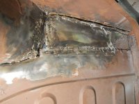 Fiber glass stripped ans spot welds drilled.jpg