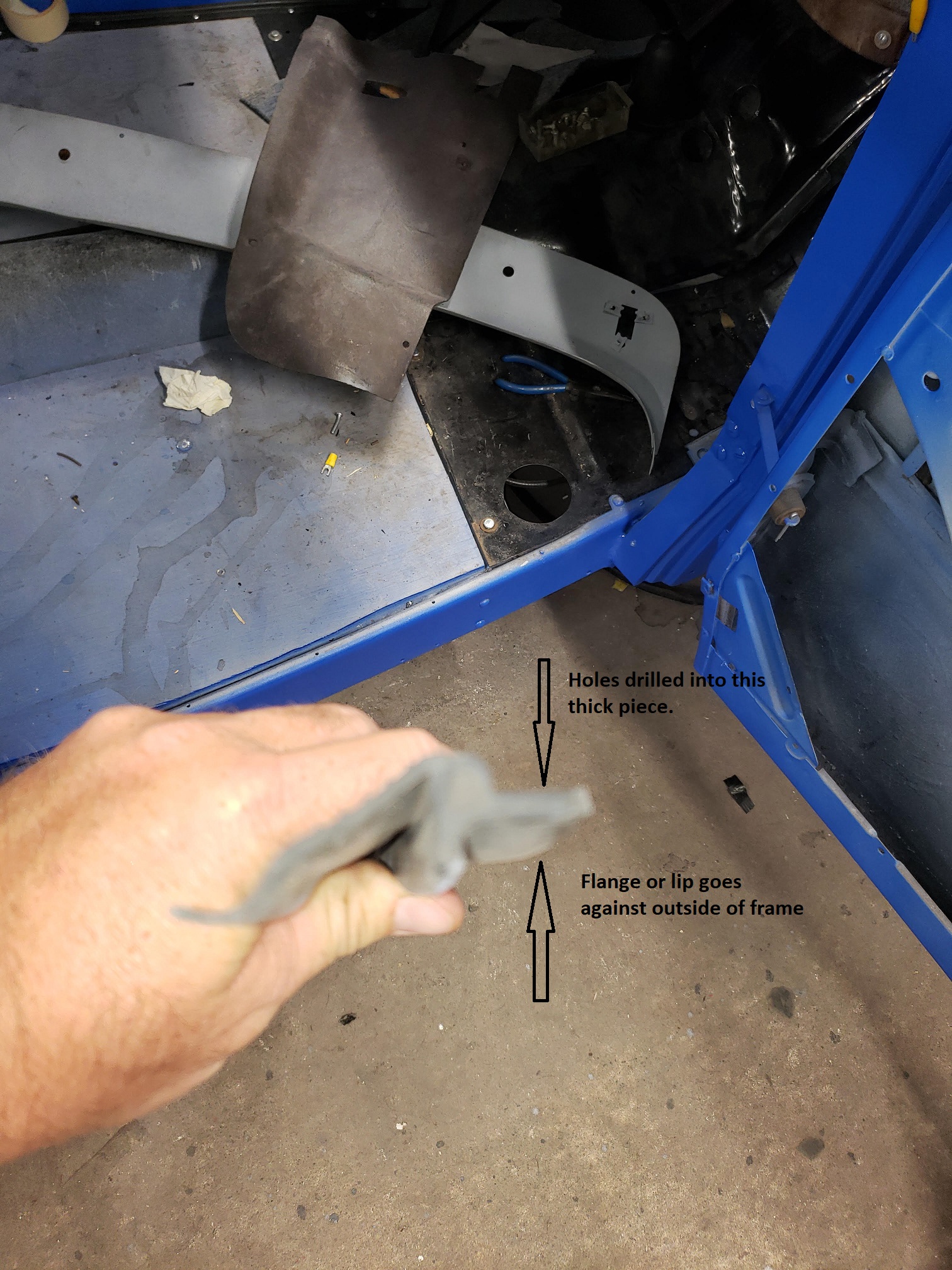 Door Bottom Weatherstrip frame holes.jpg