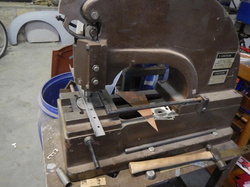 Punching plug weld holes.jpg