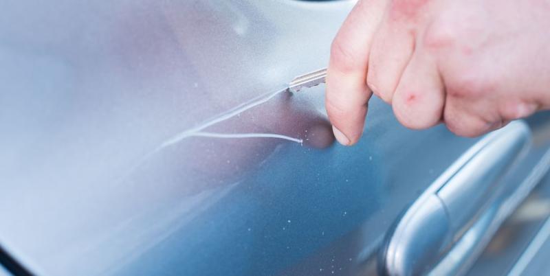 scratching-car-with-a-key-royalty-free-image-1578334635.jpg