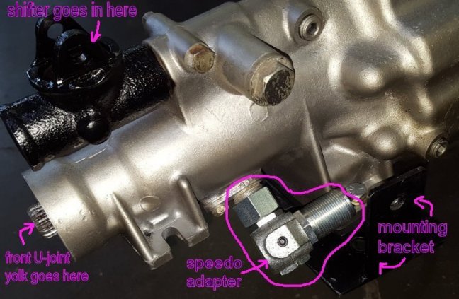 tranny - shifter end, speedo adapter and mounting bracket.jpg
