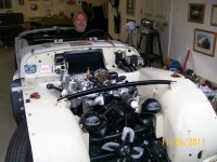 My `57TR3 being looked at by my Friend & Guru Mechanic FRED THOMAS. He approves..jpg My `57TR3 being looked at by my Friend & Guru Mechanic FRED THOMAS. He approves..jpg