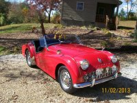 My `61TR3 passenger front view with badges & fog lights.jpg My `61TR3 passenger front view with badges & fog lights.jpg