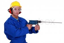 8244951-craftsman-with-earmuffs-and-protective-goggles-holding-electric-drill.jpg 8244951-craftsman-with-earmuffs-and-protective-goggles-holding-electric-drill.jpg