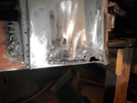 Dog leg drivers side holes..jpg