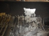 Undercoat on wing shiny metal under it.jpg Undercoat on wing shiny metal under it.jpg