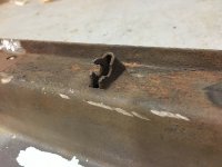 driver side check strap damage.jpg