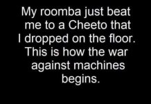 Roomba beats me to Cheeto.jpg