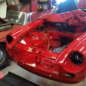 A '67 B being restored next to a pull handle '65.