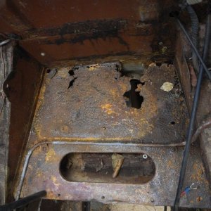 Battery shelf before repair.jpg