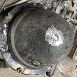 headlight bucket with repair plug.jpg