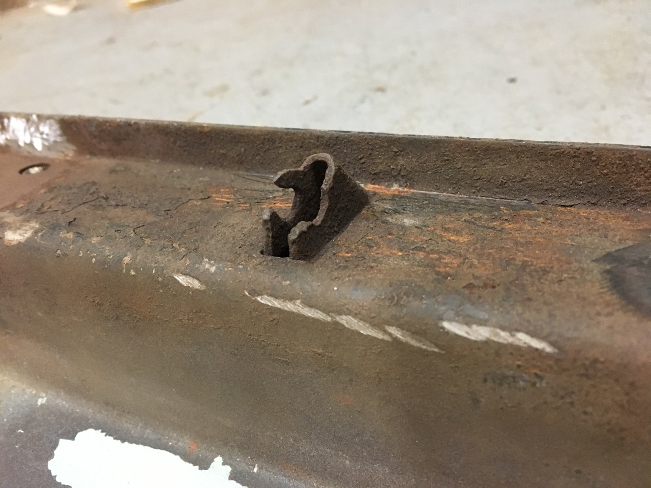 driver side check strap damage.jpg