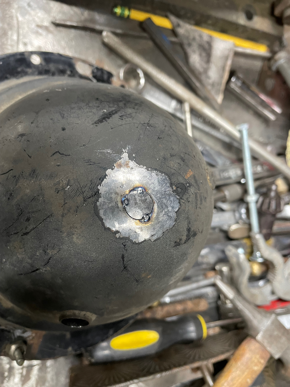 headlight bucket plug tacked.jpg